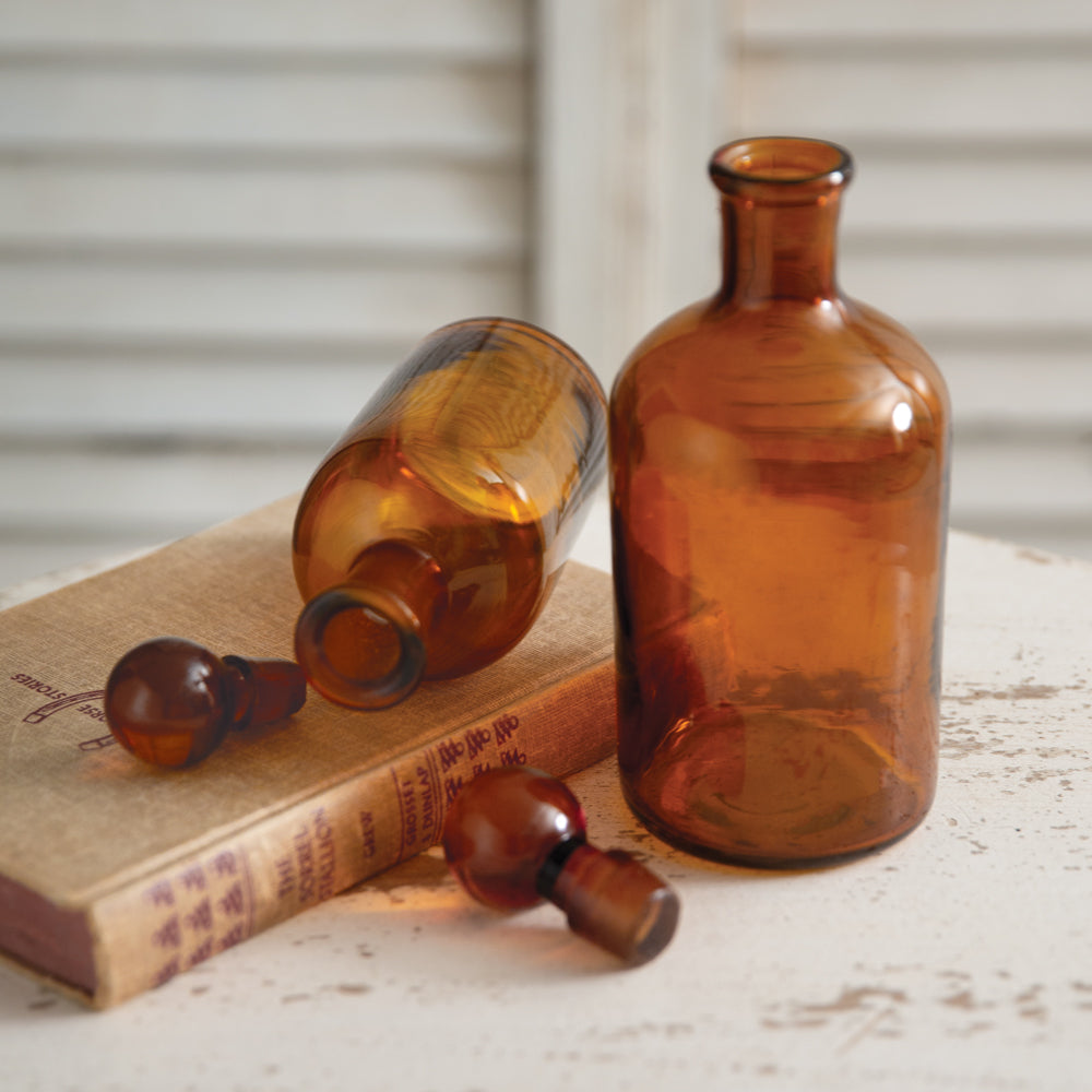 Set of Two Amber Glass Bottles with Stoppers - Bombay Mercantile