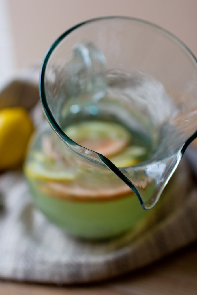 Small glass tilted pitcher - Bombay Mercantile