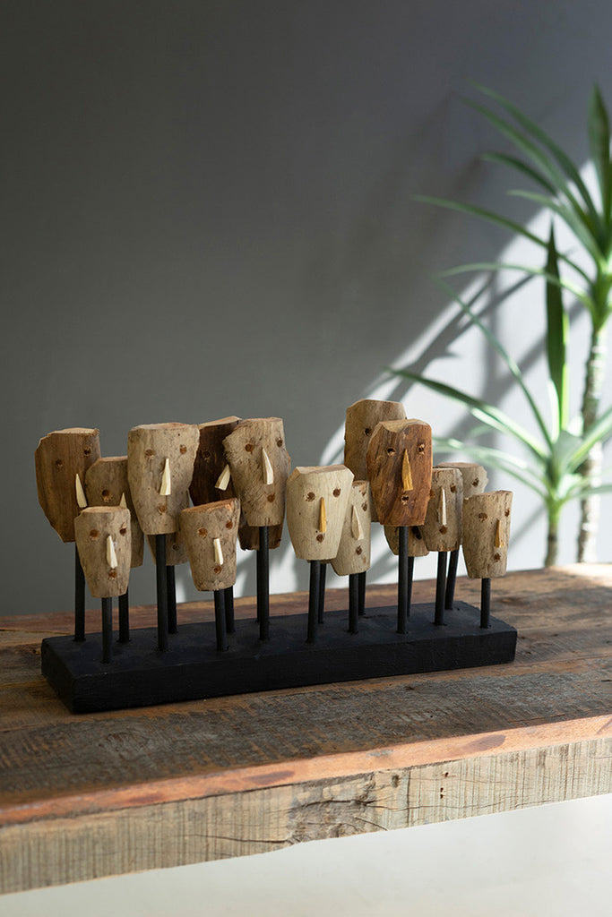 Carved Wooden Masks on a Wooden Base - Bombay Mercantile