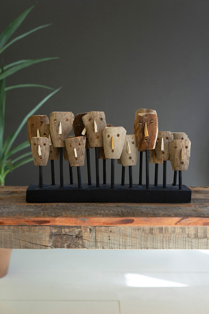 Carved Wooden Masks on a Wooden Base - Bombay Mercantile