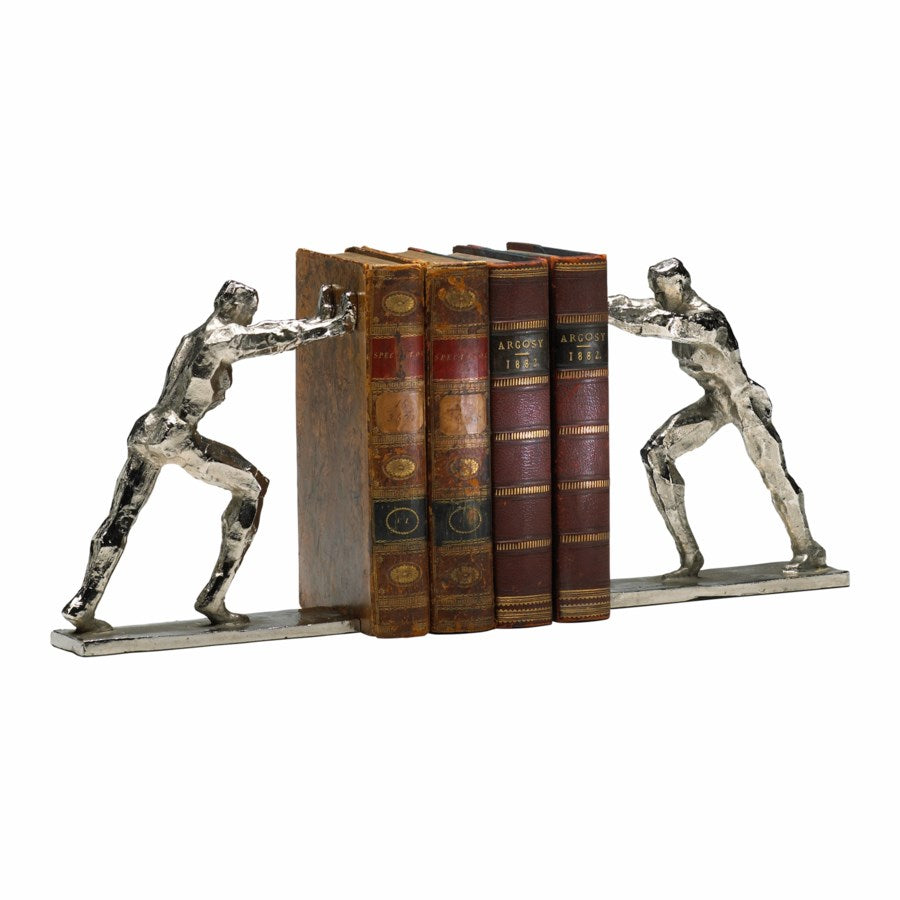 Man in cast iron bookends - The Nifty Decor