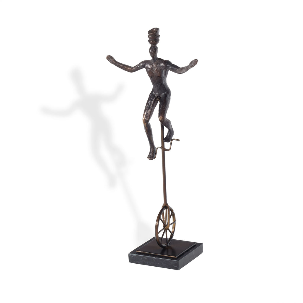 Unicycle balancing act sculpture - The Nifty Decor