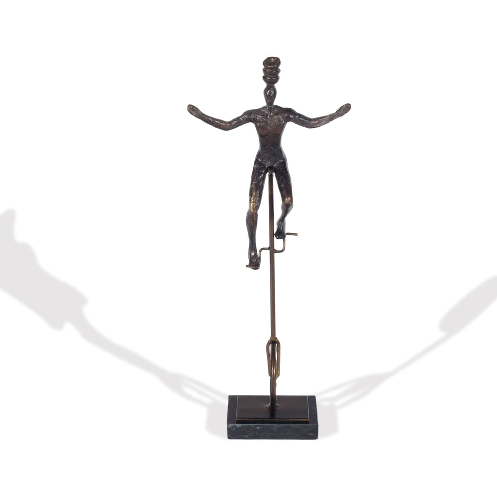 Unicycle balancing act sculpture - The Nifty Decor