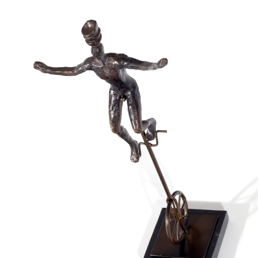 Unicycle balancing act sculpture - The Nifty Decor