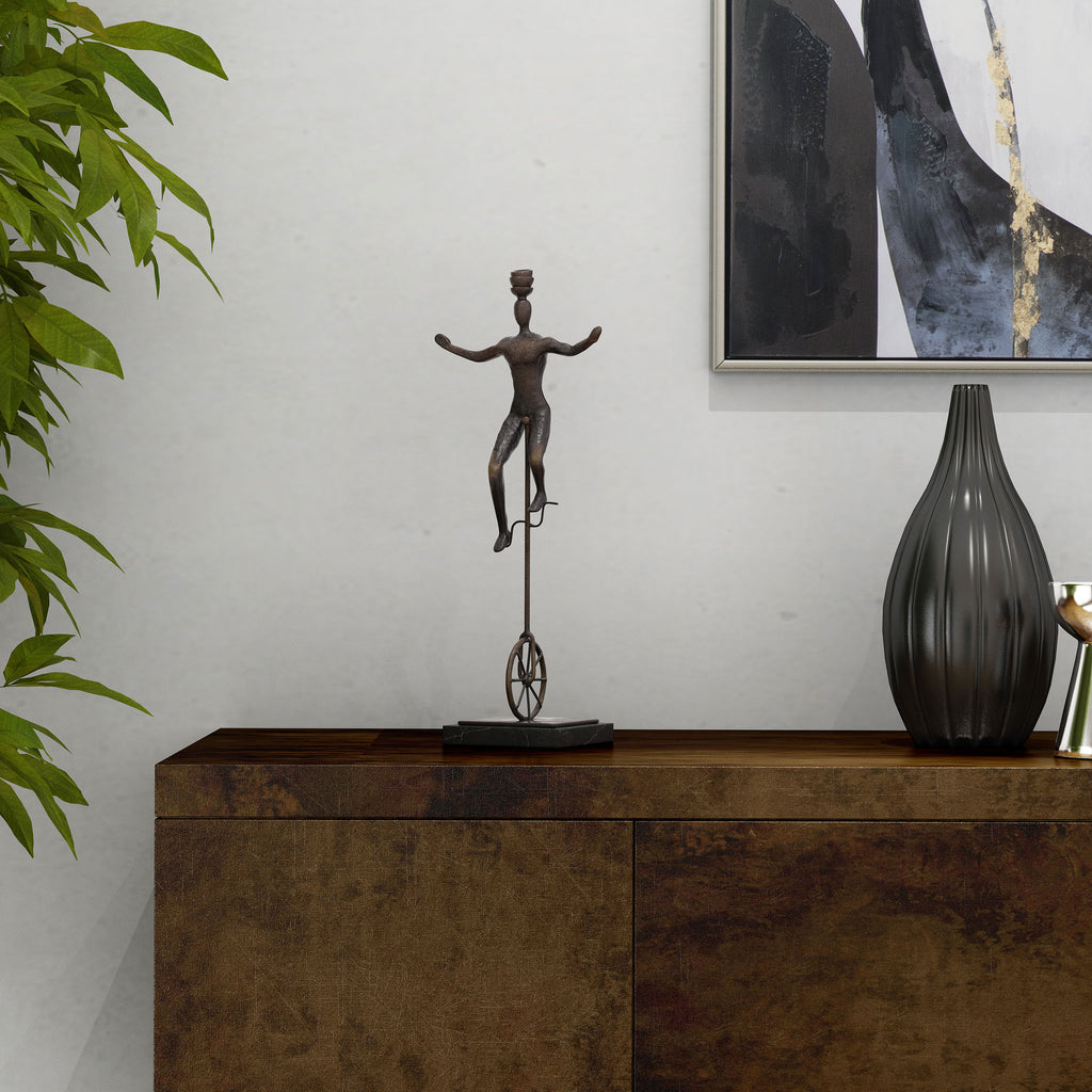 Unicycle balancing act sculpture - The Nifty Decor