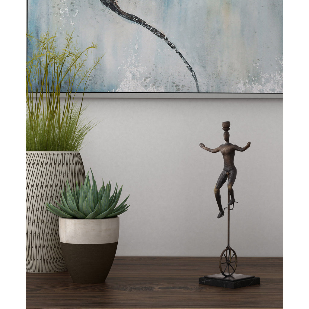 Unicycle balancing act sculpture - The Nifty Decor