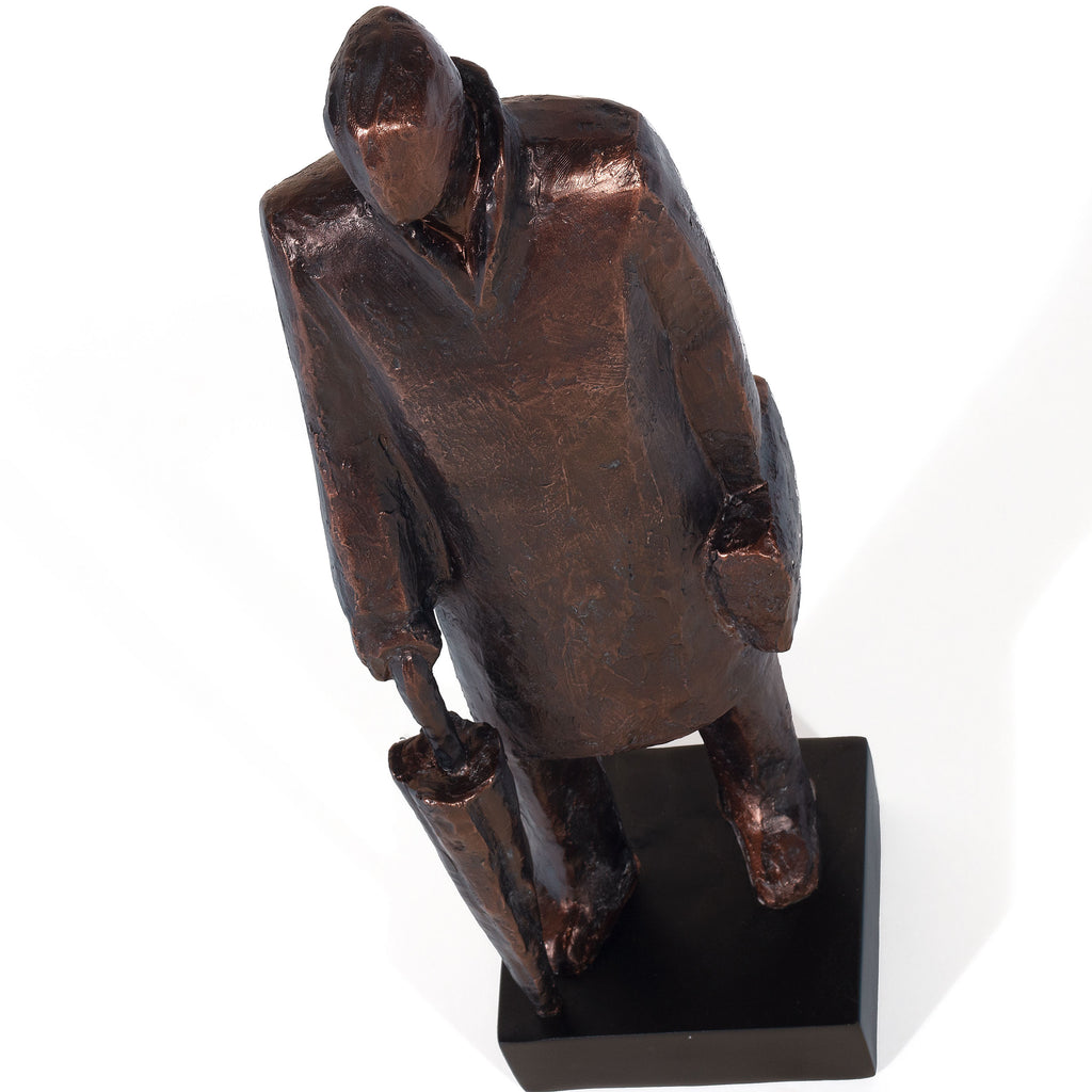 Man holding a briefcase sculpture - The Nifty Decor