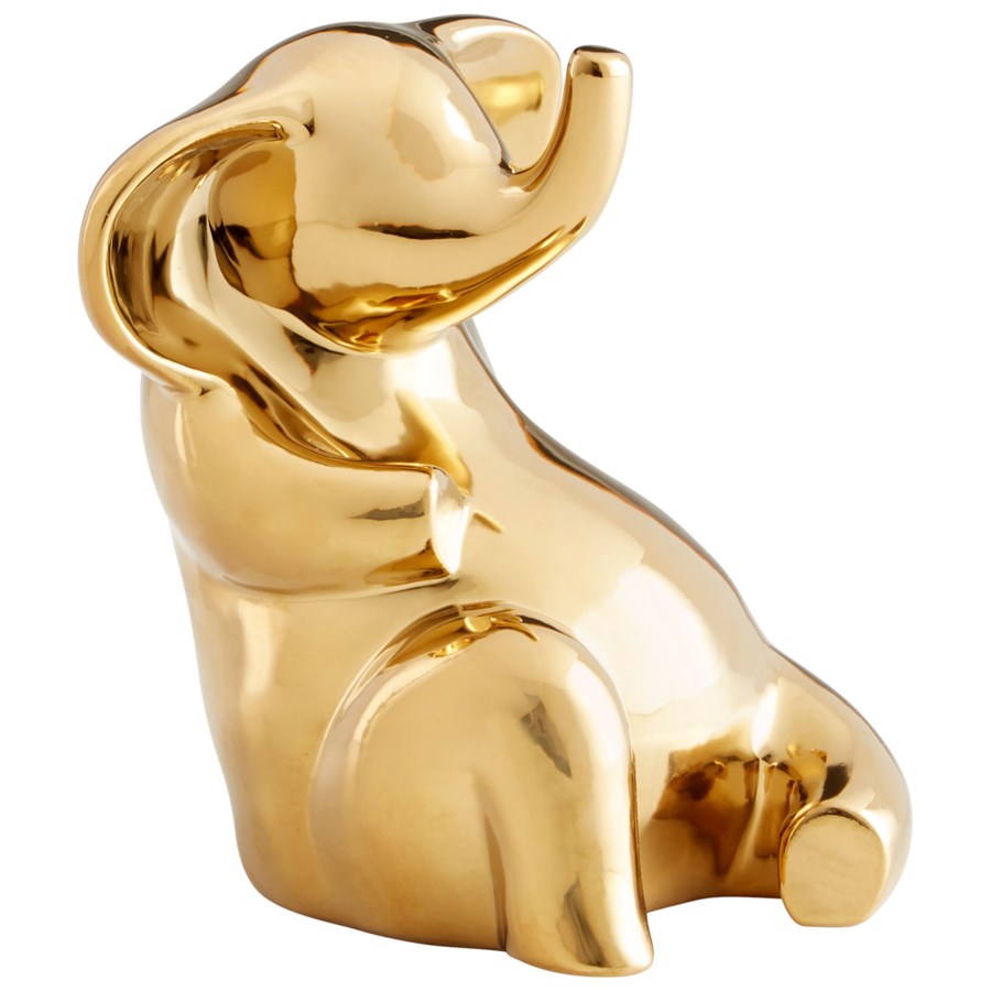 Gold elephant sculpture. - The Nifty Decor