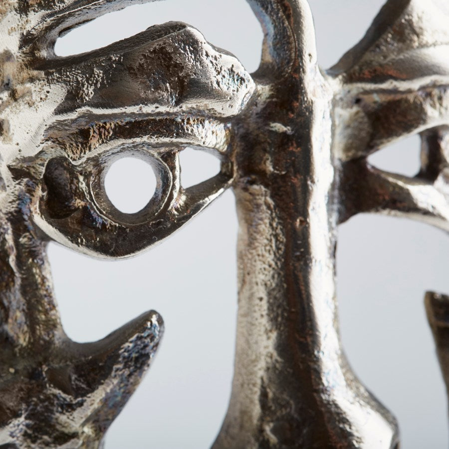 Sculpture depicting facial forms - The Nifty Decor