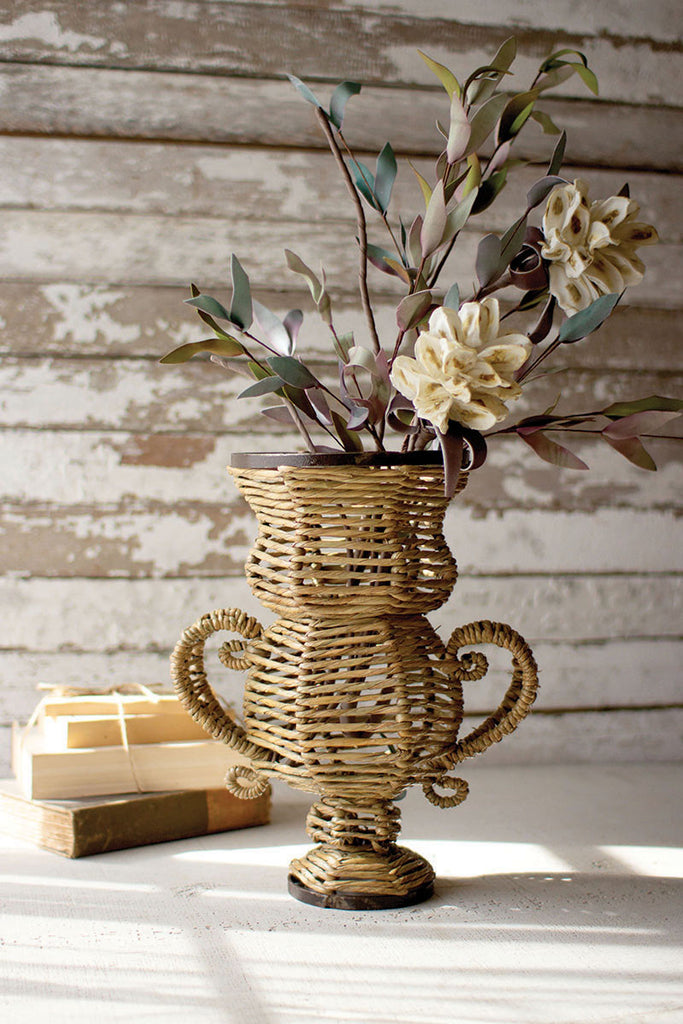 Small haitian seagrass and iron urn - The Nifty Decor