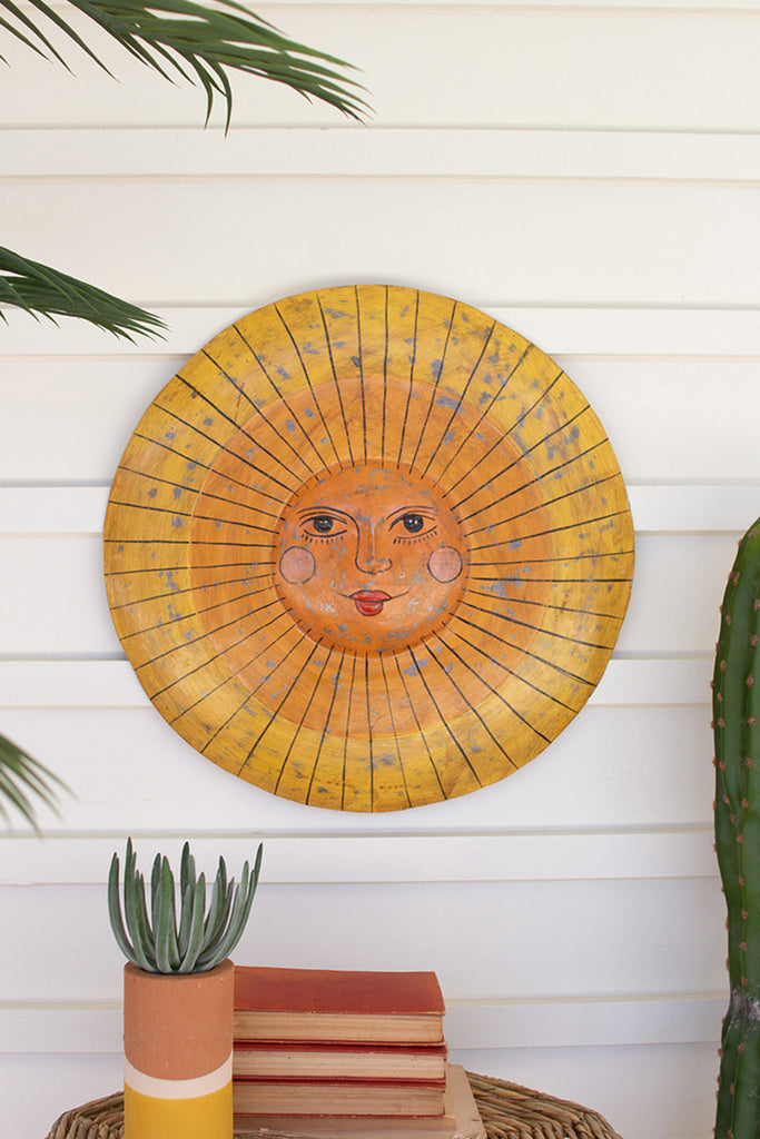 Hand-hammered sun face - The Nifty Decor