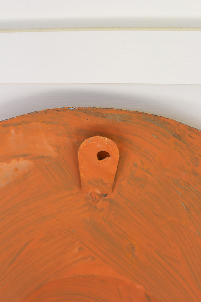 Hand-hammered sun face - The Nifty Decor