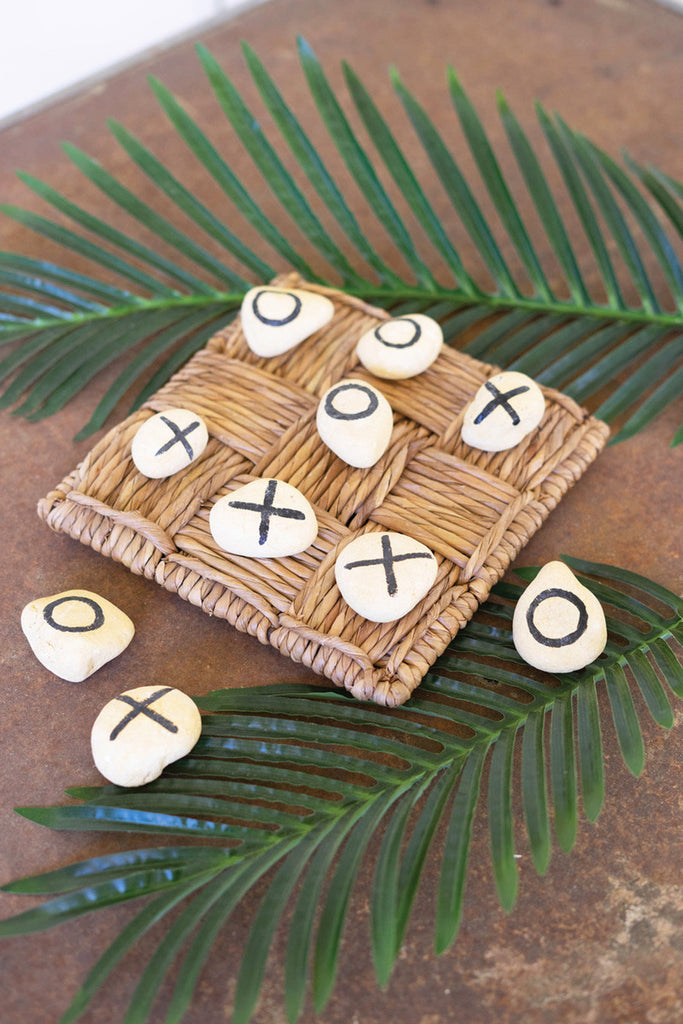 River rock tic-tac-toe on woven rush gameboard - Bombay Mercantile