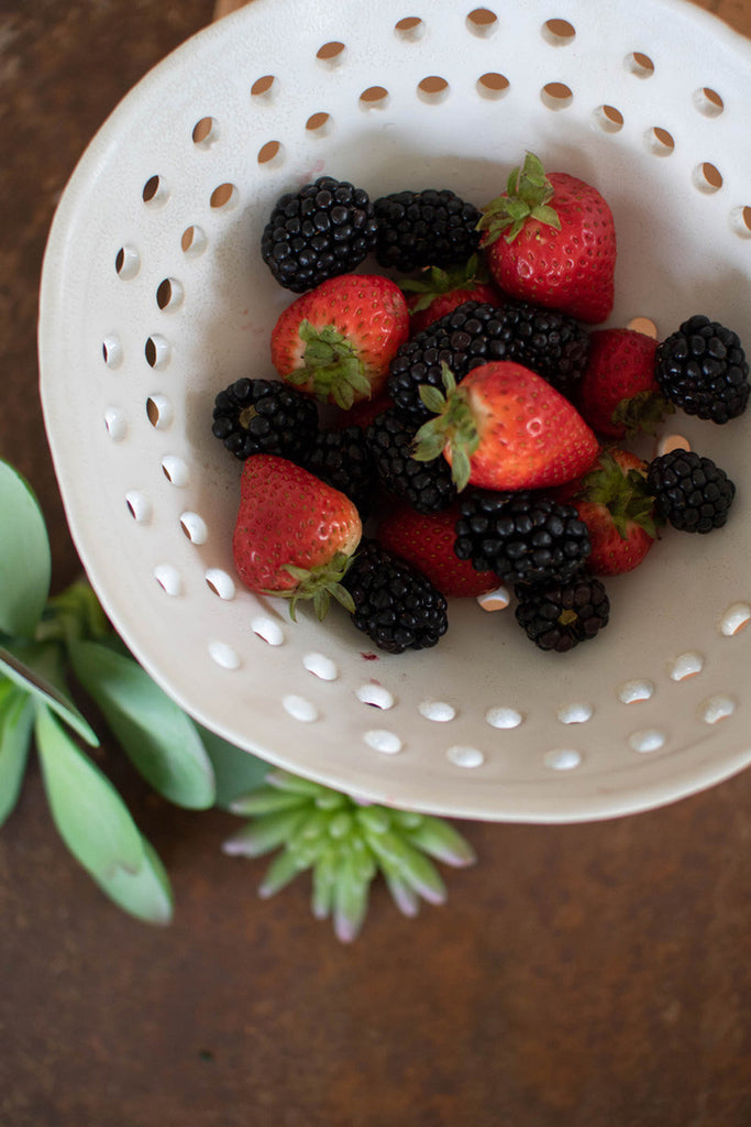 Footed white ceramic berry bowl - Bombay Mercantile