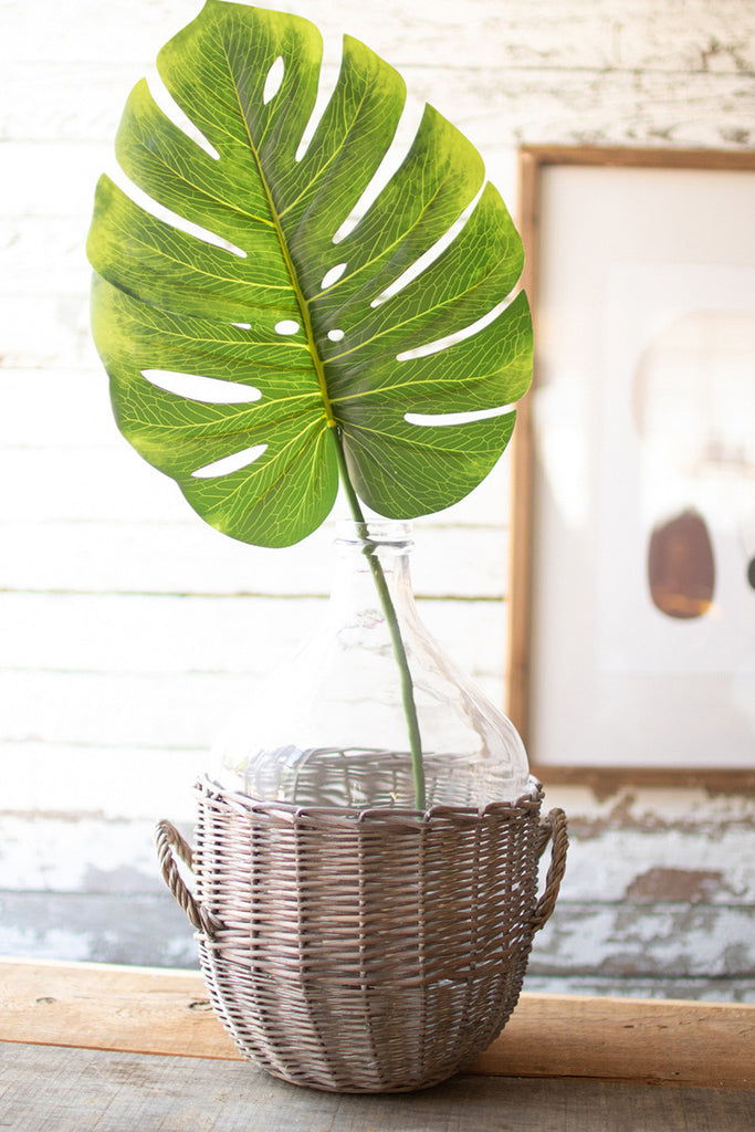 Clear glass damigiana with grey wicker wrap - The Nifty Decor