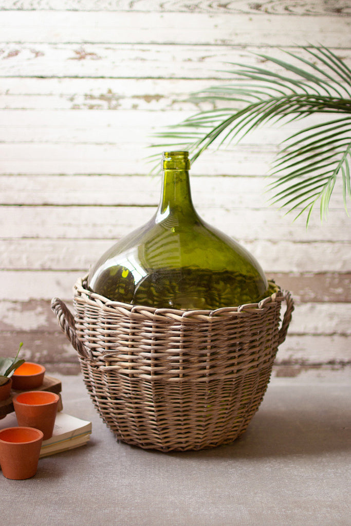 Green glass damigiana with wicker wrap - The Nifty Decor