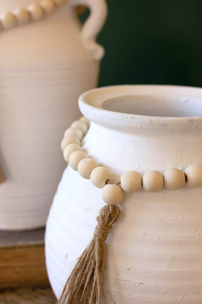Set of 2 white clay pots with wood bead tassels - Bombay Mercantile