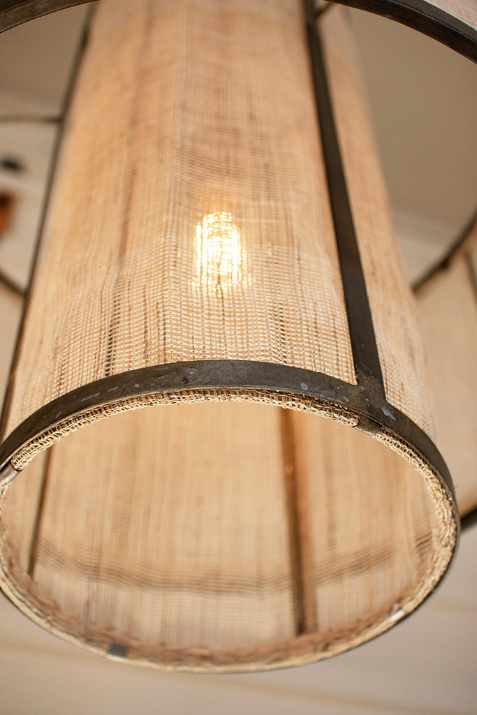 Round double layered woven fiber and metal pendant light - The Nifty Decor
