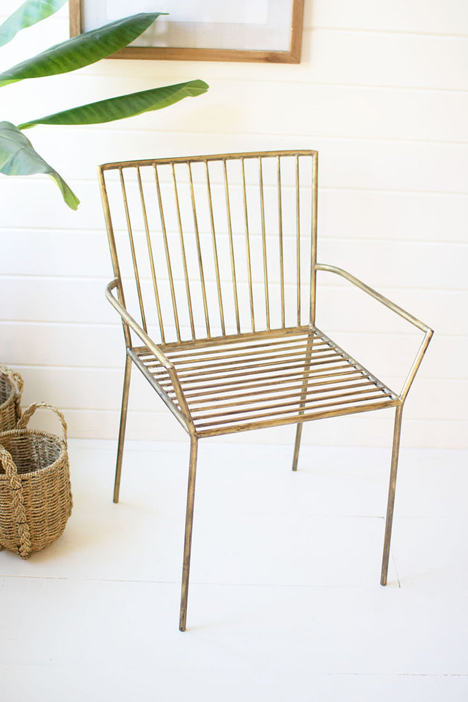 Accent chair with brass finish - The Nifty Decor