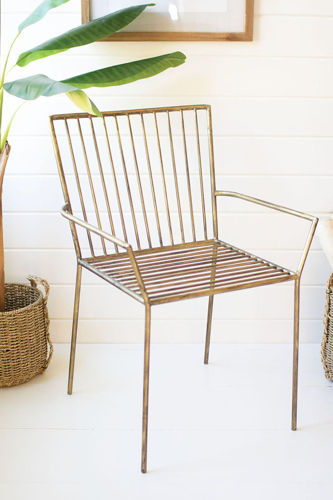 Accent chair with brass finish - The Nifty Decor