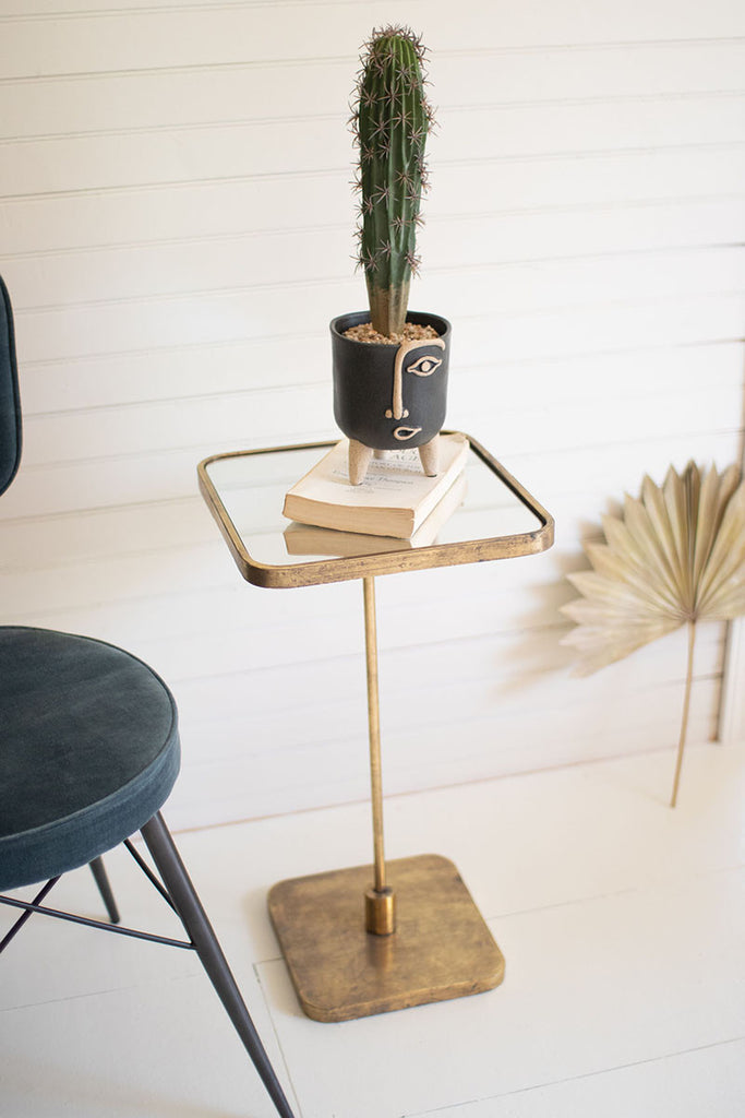 Accent cocktail table with mirror top - The Nifty Decor