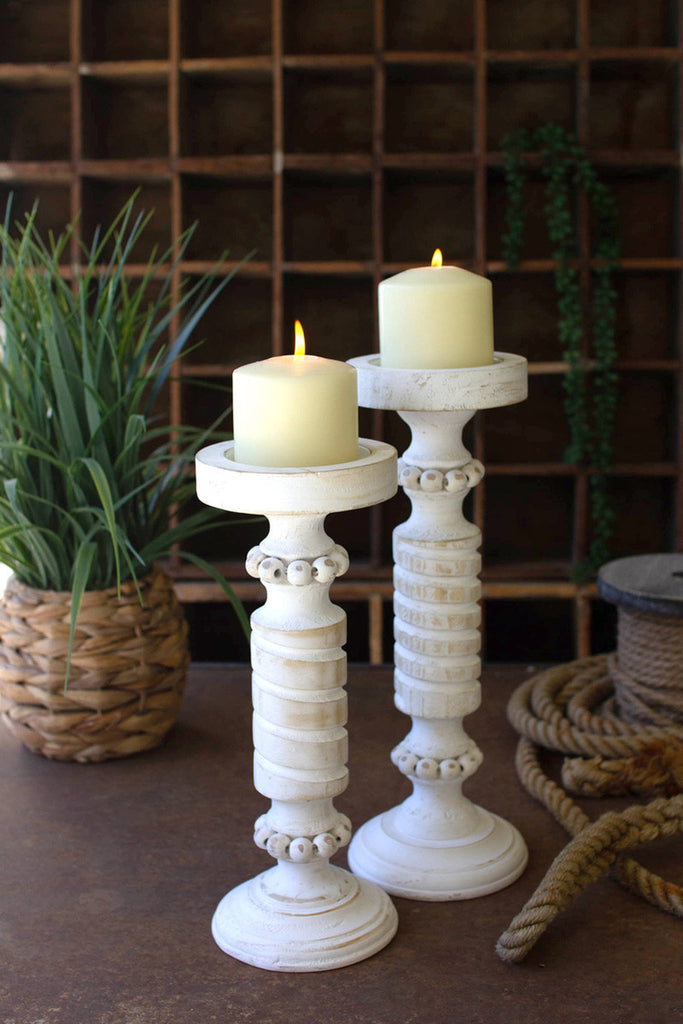 Set of 2 white washed carved wooden candle stands - Bombay Mercantile