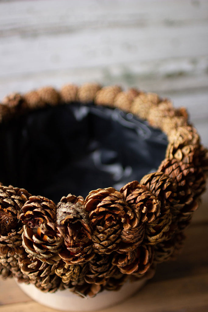 Pinecone urn with turned wood bases - The Nifty Decor
