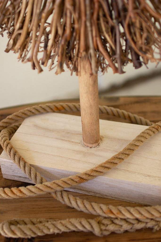 Twig sculpture on a wooden base - The Nifty Decor