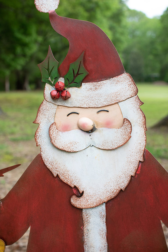 Painted metal welcome Santa yard art - The Nifty Decor
