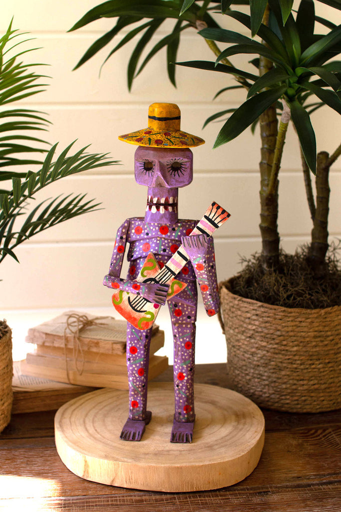 Painted wooden skeleton guitarist - Bombay Mercantile