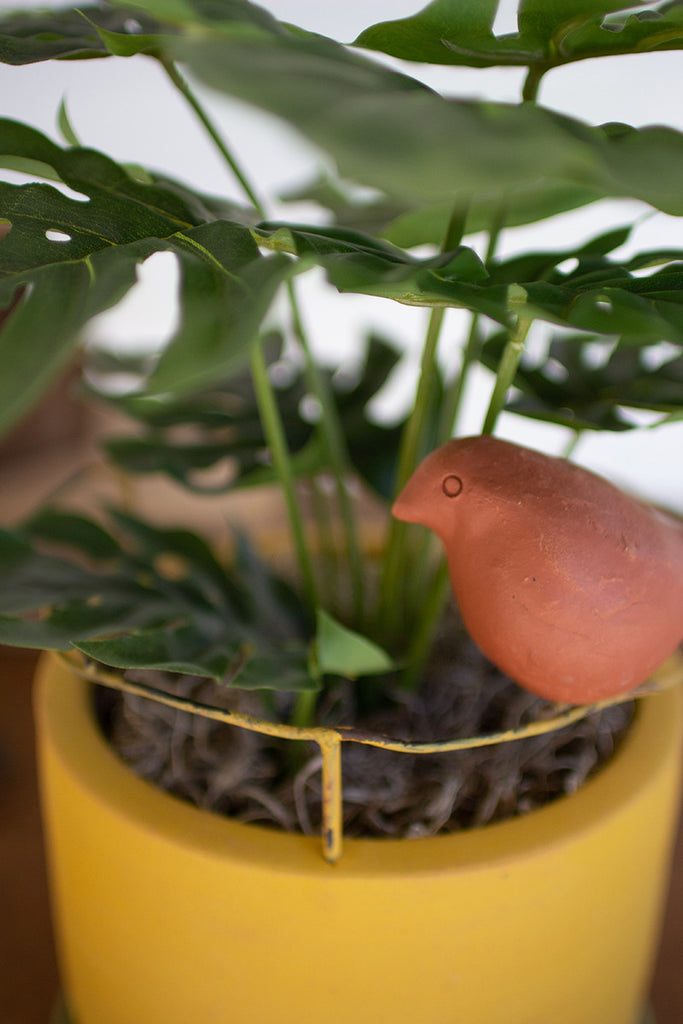 Planter with perched bird detail - The Nifty Decor