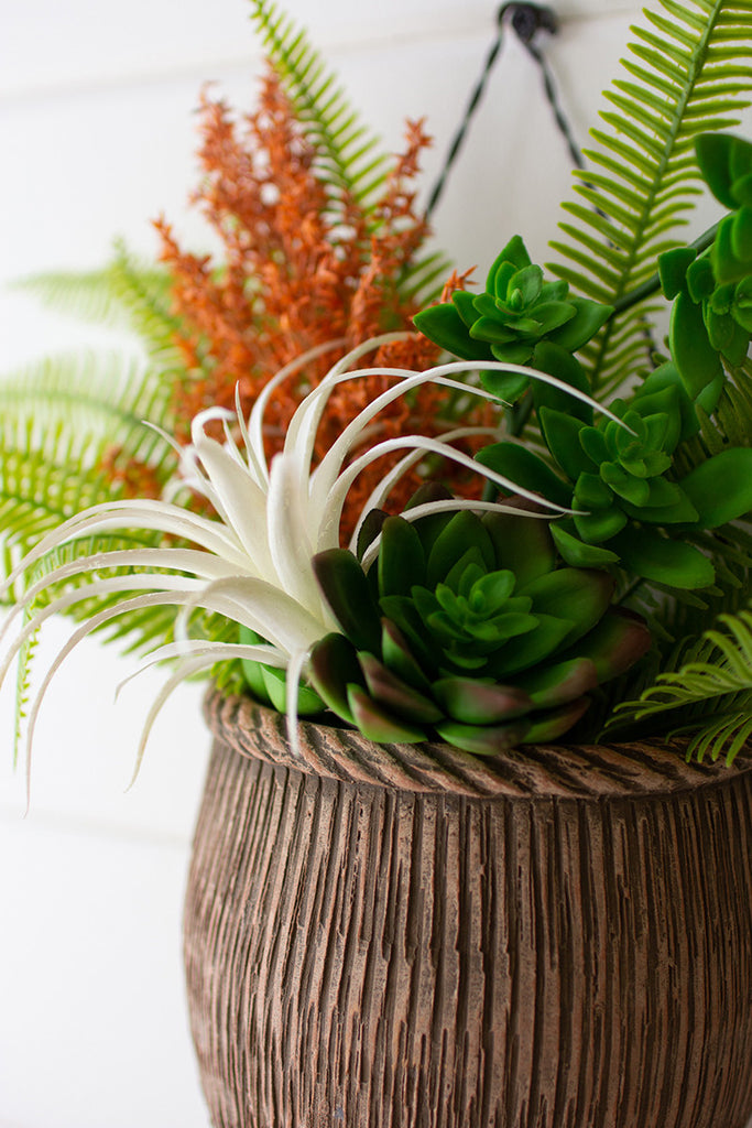 Hanging clay pot with cotton fringe - The Nifty Decor
