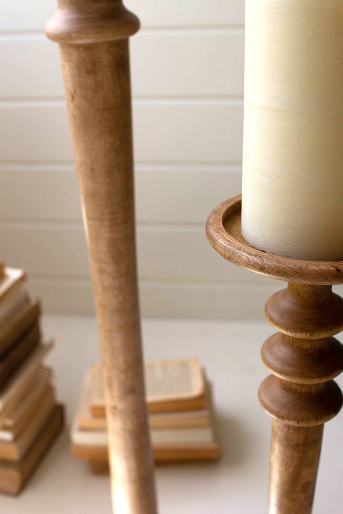 Set of 2 tall mango wood pillar candle stands - Bombay Mercantile
