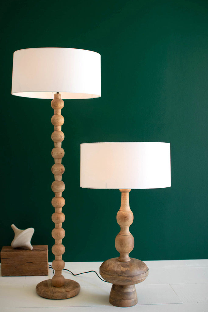 Carved wooden floor lamp with off-white barrel shade - Bombay Mercantile