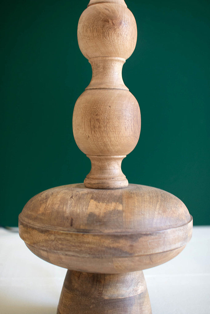 Carved wooden table lamp with off-white barrel shade - Bombay Mercantile