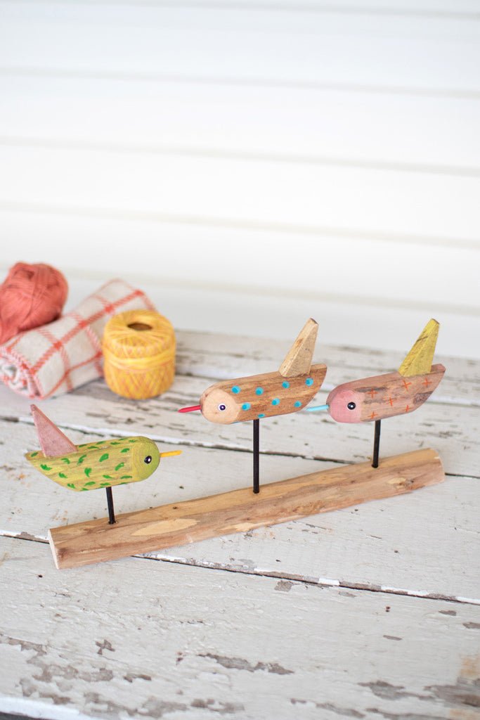 Three painted wooden birds on a base - Bombay Mercantile