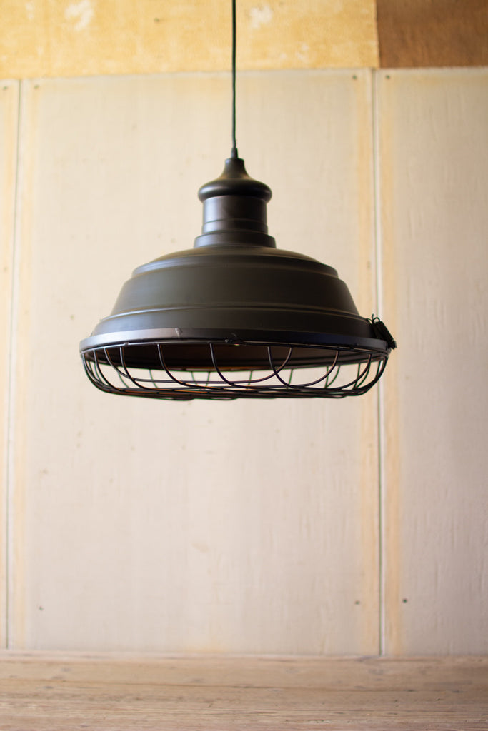 Black metal caged pendant light - The Nifty Decor