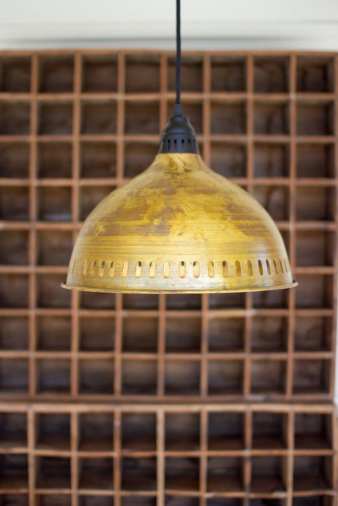 Antique brass pendant light with perforated detail - The Nifty Decor
