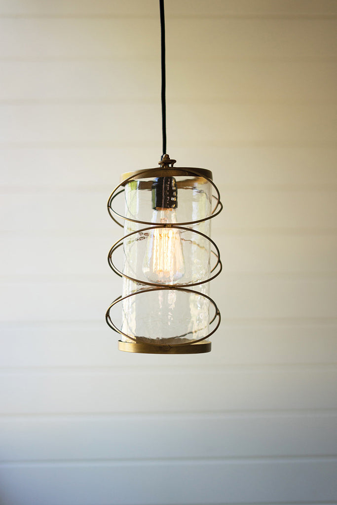 Cylindrical light with brass detail - The Nifty Decor