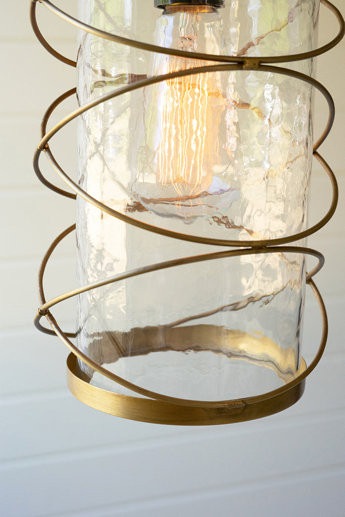 Cylindrical light with brass detail - The Nifty Decor