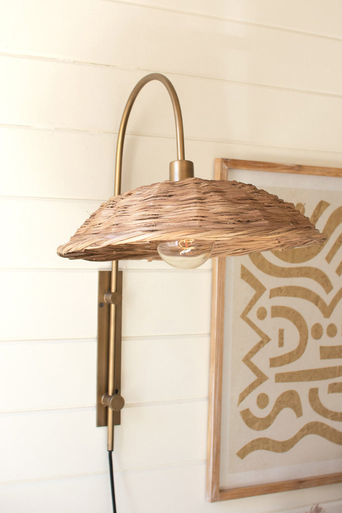 Antique brass wall light with rattan shade - Bombay Mercantile