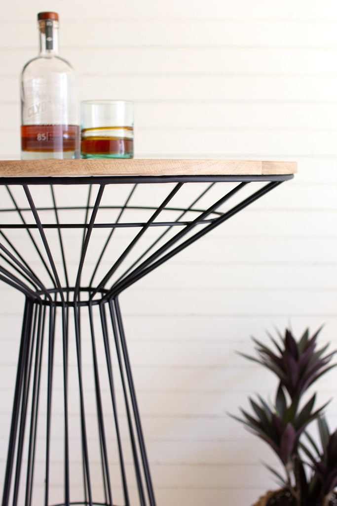 Iron bar table with round wooden top - Bombay Mercantile