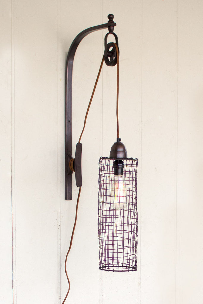 Wire cylinder wall lamp with pulley - The Nifty Decor