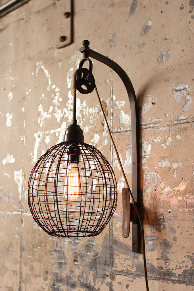 Wire sphere wall sconce with pulley. - The Nifty Decor