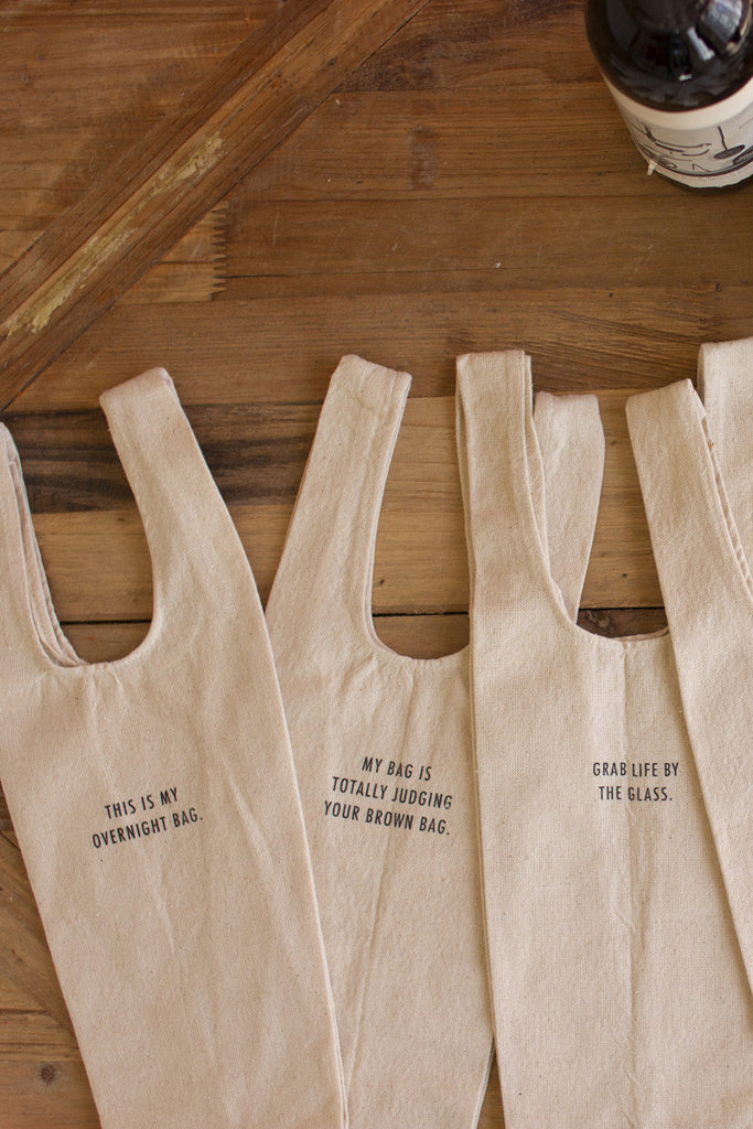 Set of 6 wine bags with quirky sayings - Bombay Mercantile