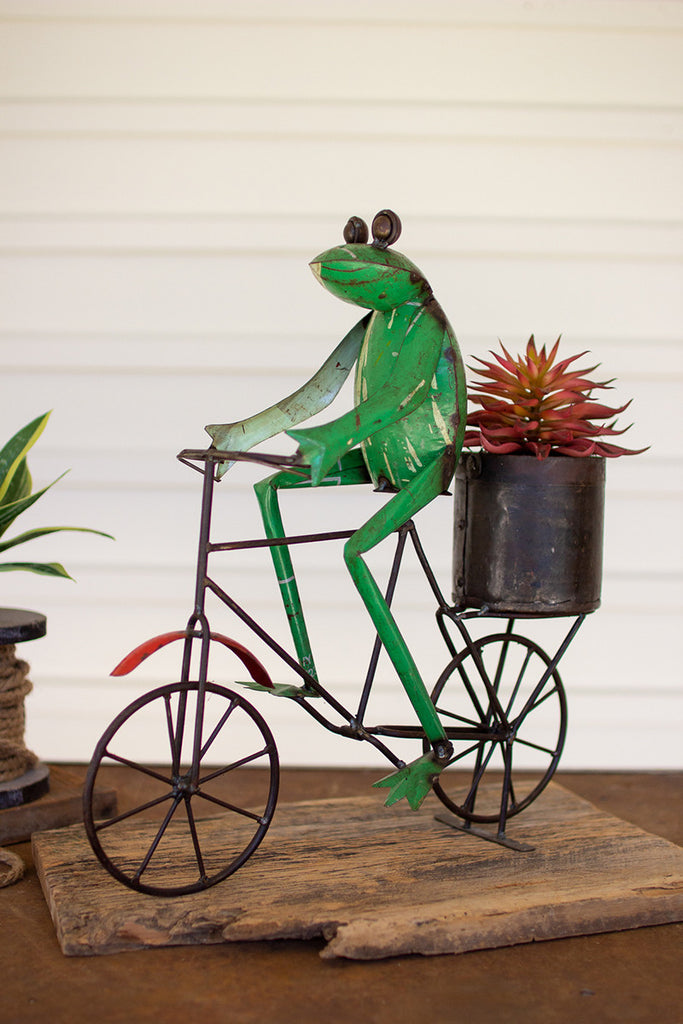 Frog on a bicycle with pot - The Nifty Decor