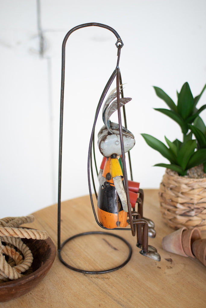 Two recycled iron rabbits on a swing - Bombay Mercantile